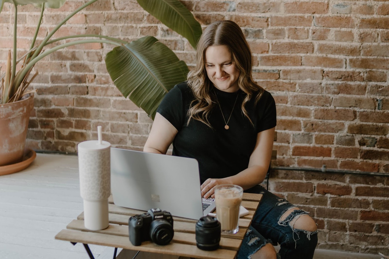 Becky Nelson working hard at editing photos for clients