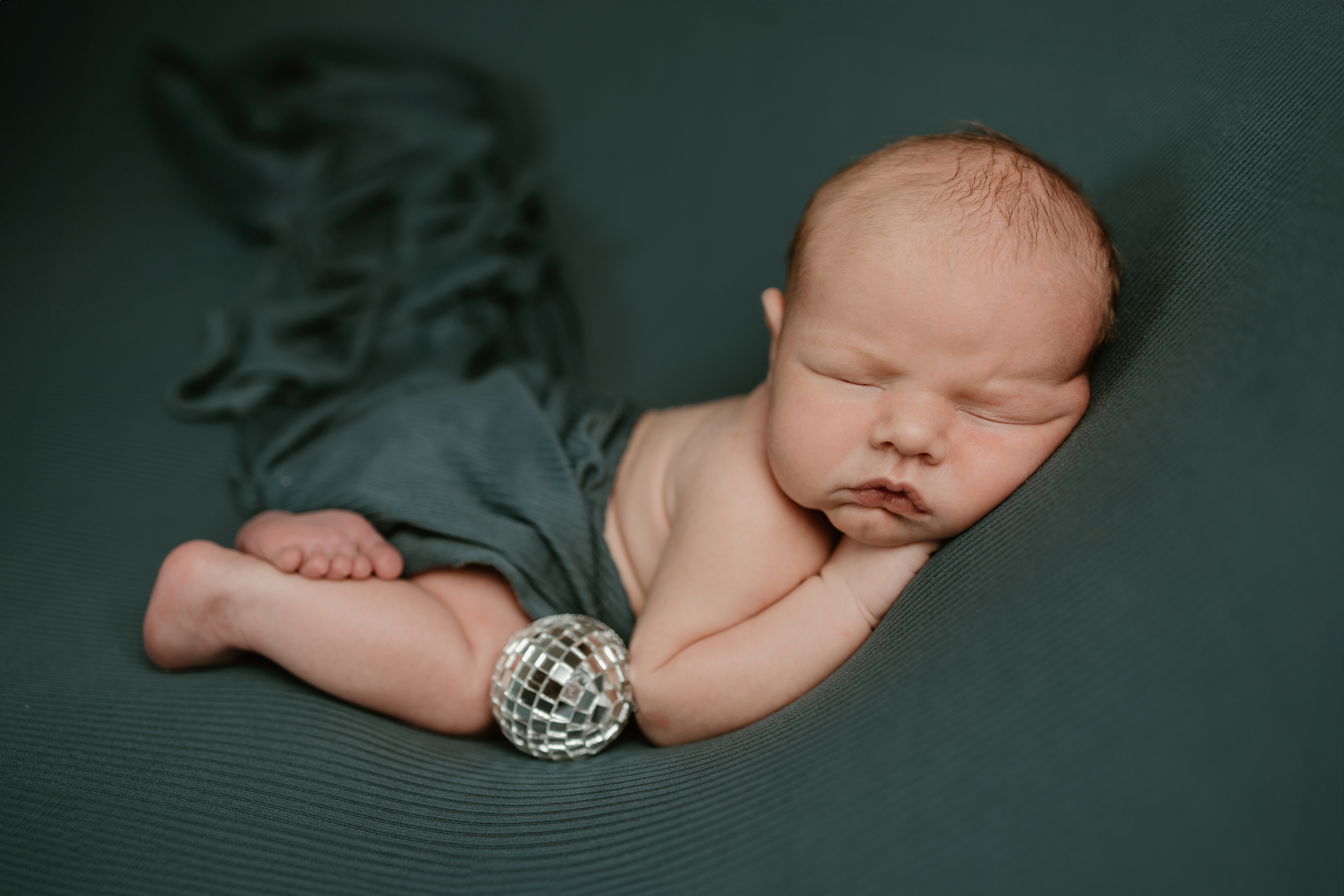 Newborn baby gets picture taken